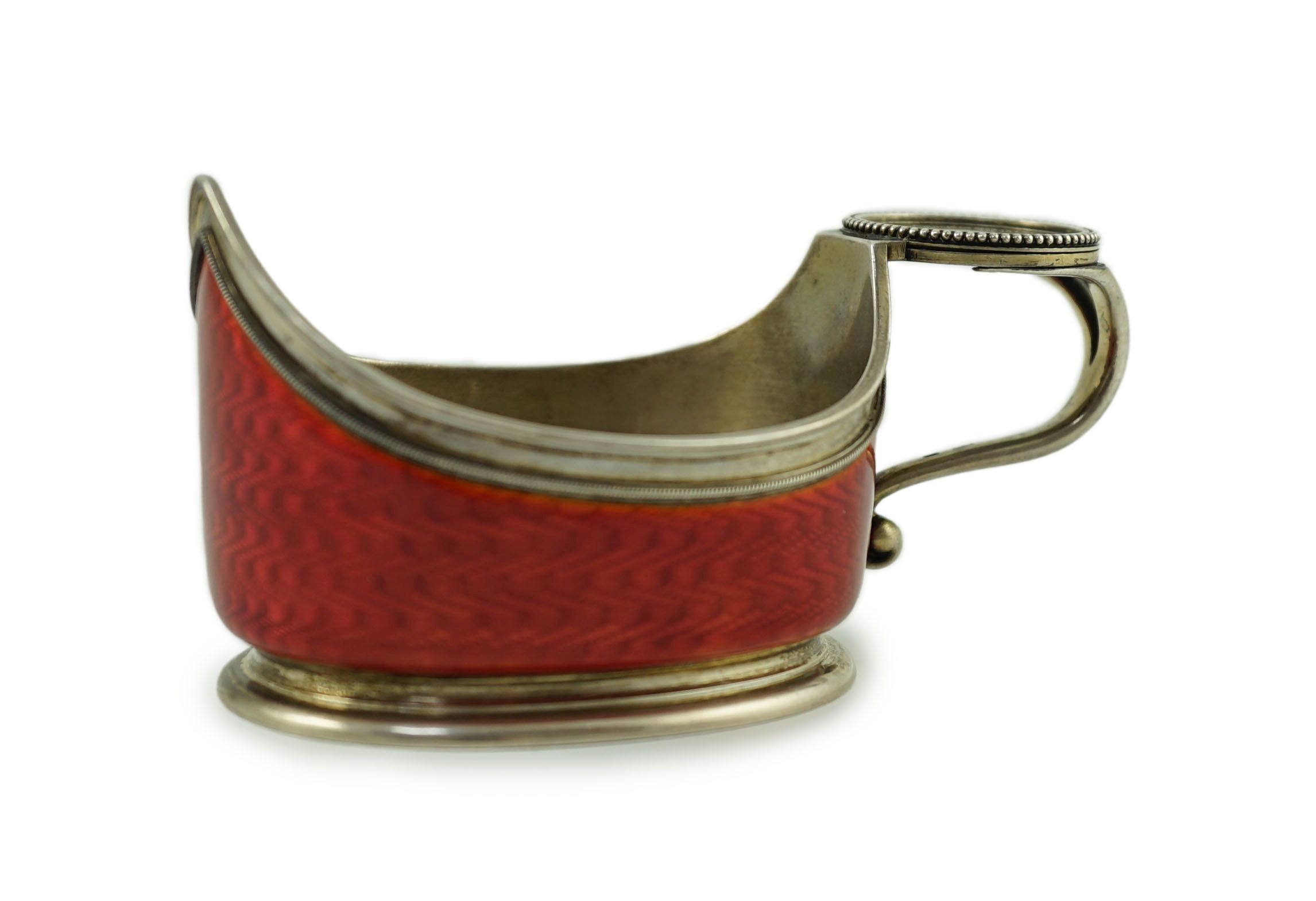 CARL FABERGE: A late 19th/early 20th century 88 zolotnik and red guilloche enamel oval kovsh, work master Anders Johan Nevalainen